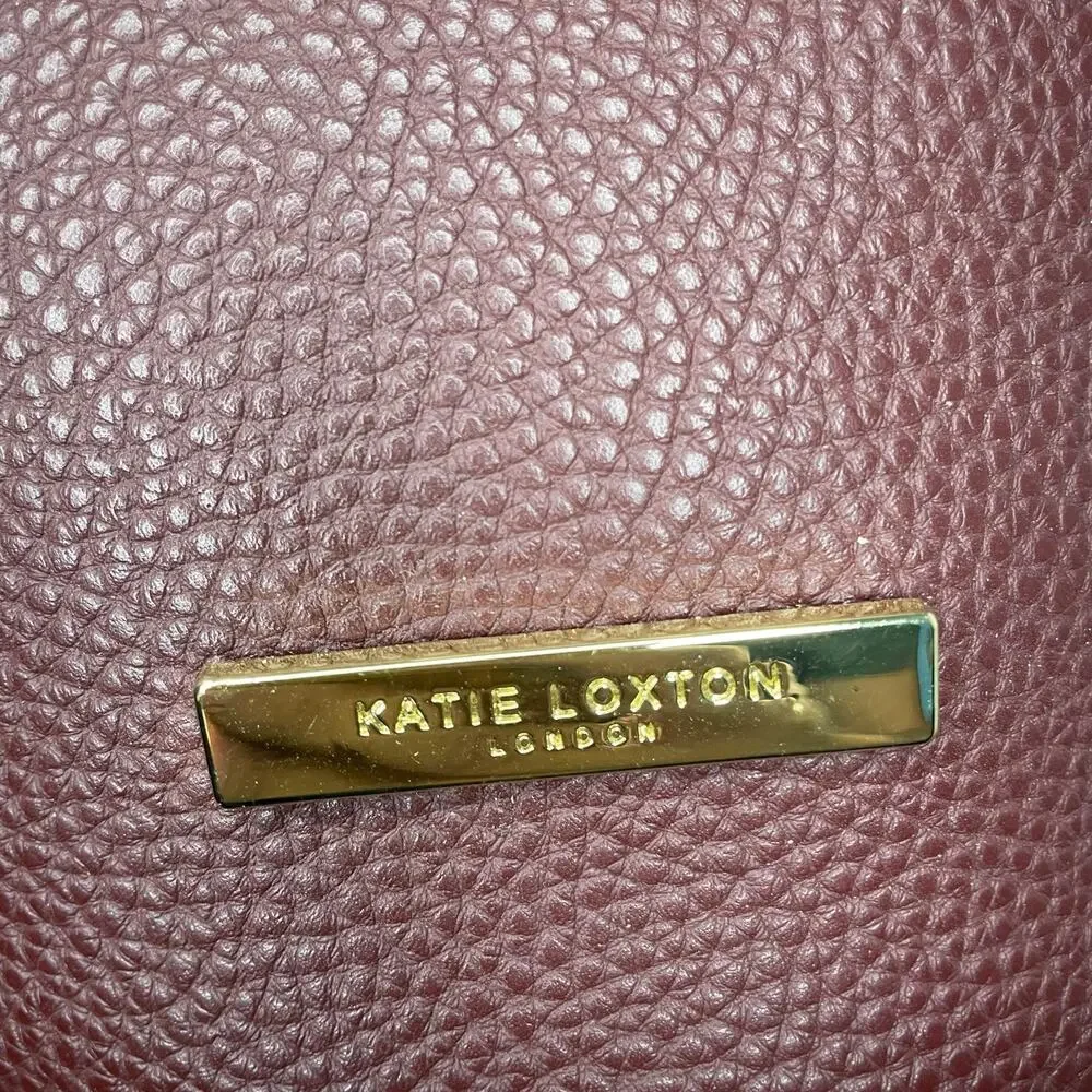 Katie Loxton London Burgundy Pebbled Bucket Crossbody Shoulder Bag Gold Ring
